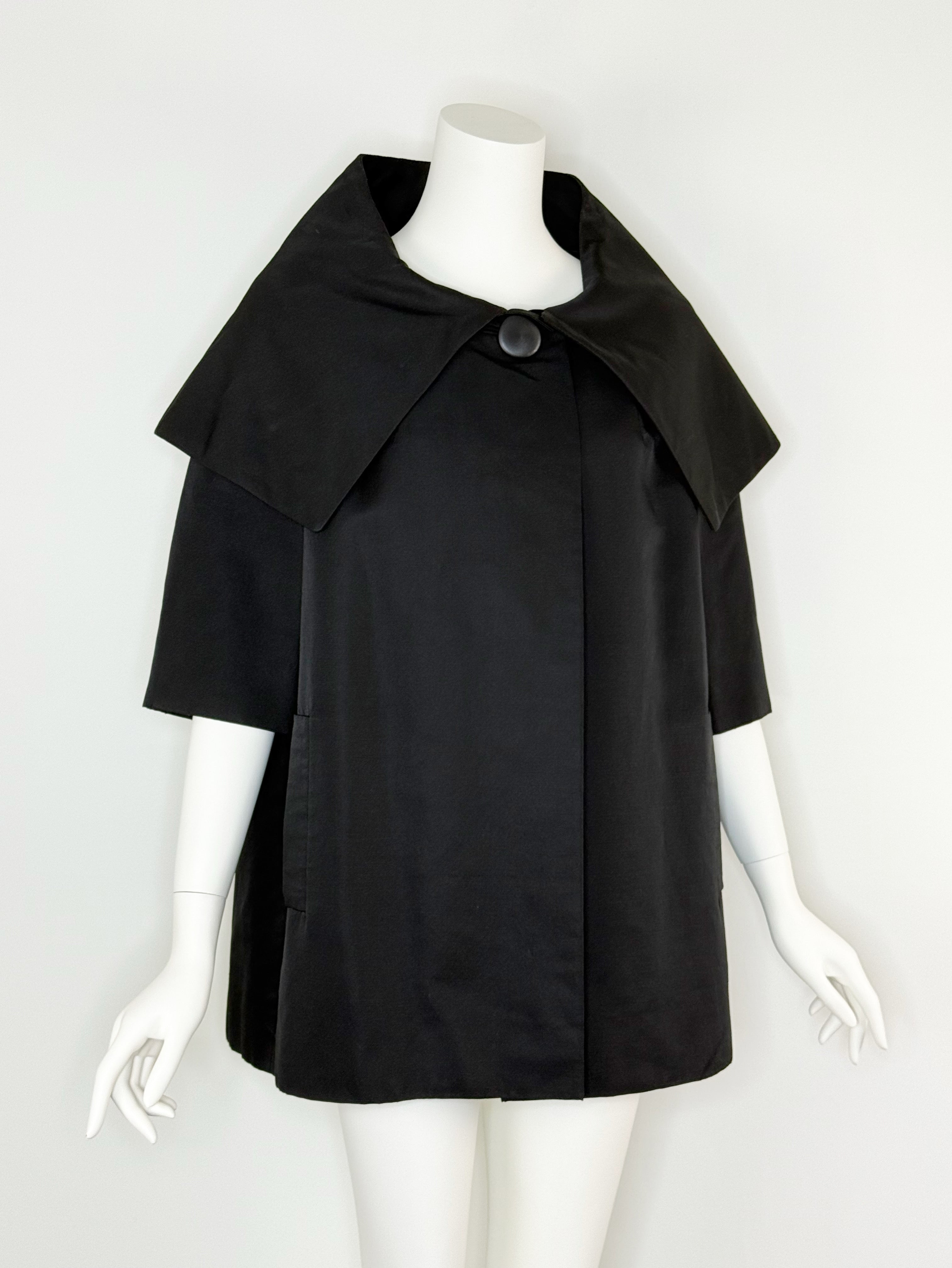 1950s black textured silk evening coat by Monte-Sano & Pruzan Pruzan